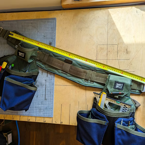 Measuring a toolbelt laid flat