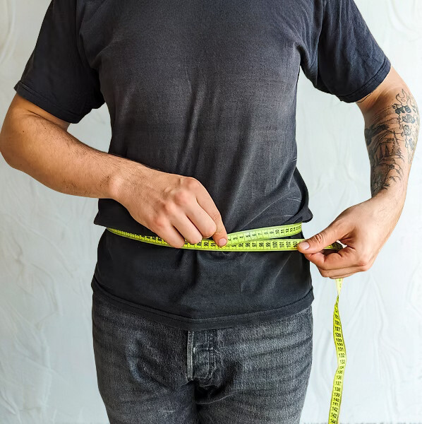 Measuring your body with a tape measure